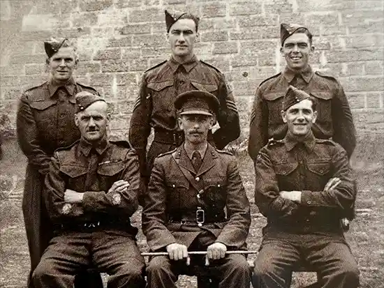Major Bill Auxenfans with his men 1944